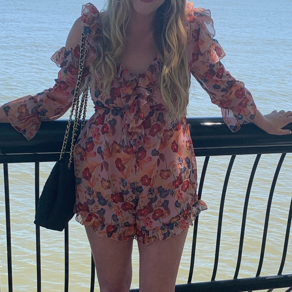 Floral detailed ruffle Romper open back with string ties and scalloped short